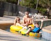 Group taking a ride on the outdoor lazy river at South Wind resort in Myrtle Beach