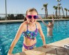 Girl at pool at Landmark Resort