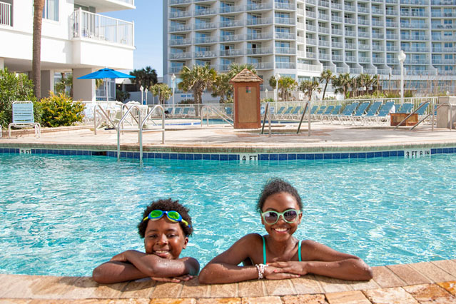 kids swimming in sea watch resort pool