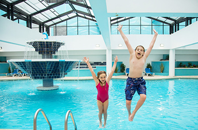 Kids at an indoor pool