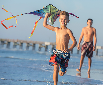 Kid flying a kite
